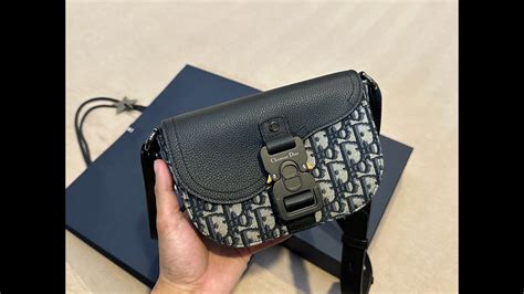 dior vertical saddle pouch|dior buckle bag.